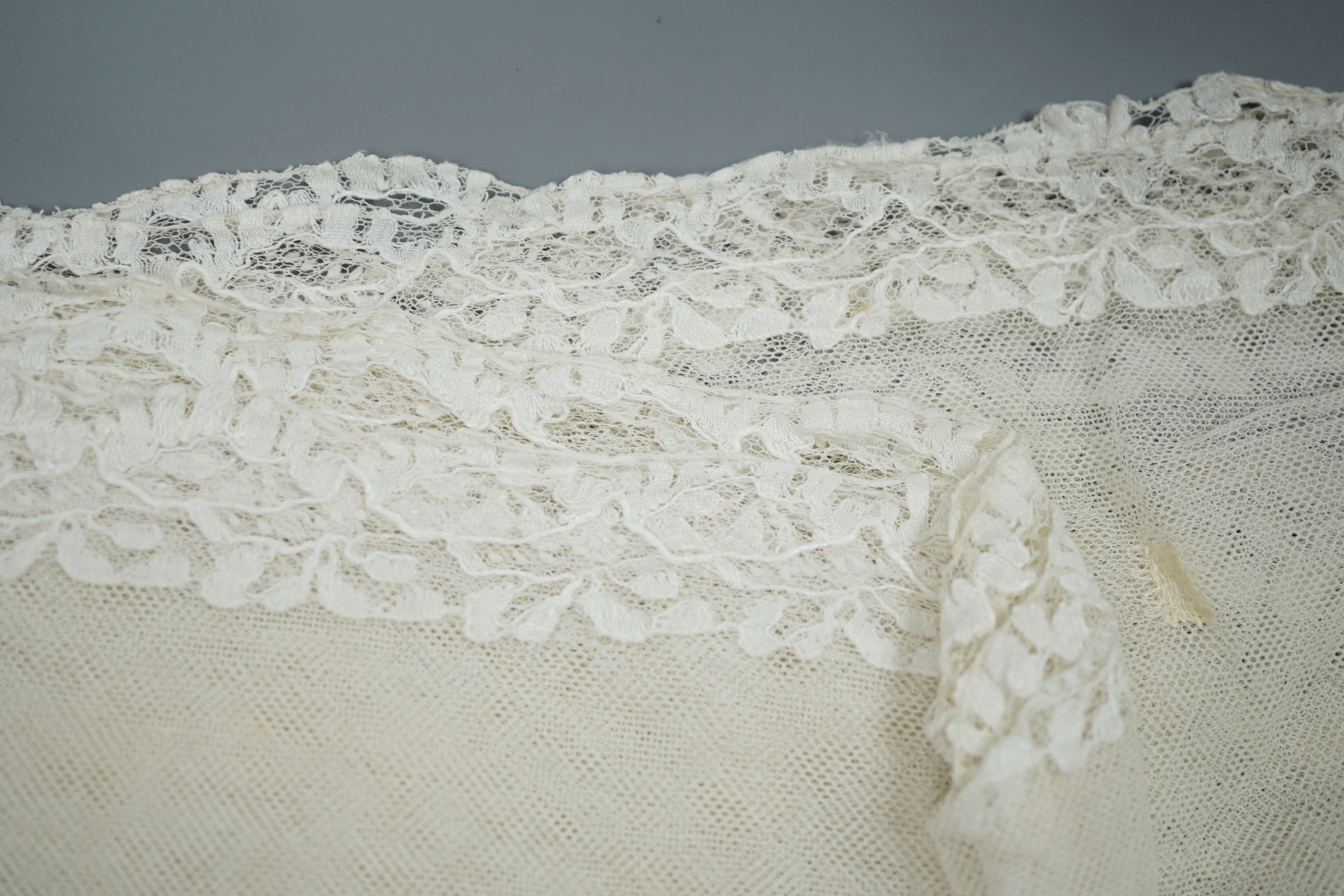 A needle lace skirt panel, a similar stole, various machine laces and trimmings